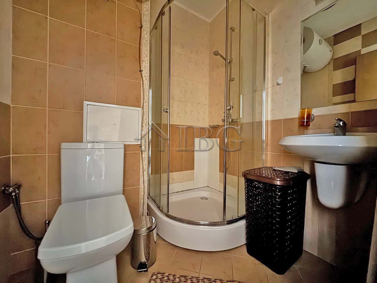 Cozy bathroom in a furnished one-bedroom apartment at Royal Sun, Sunny Beach, featuring a shower, to.