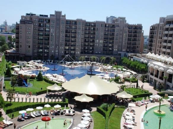 Luxury pool with sun loungers and umbrellas at Royal Beach Barcelo, Sunny Beach, Bulgaria.