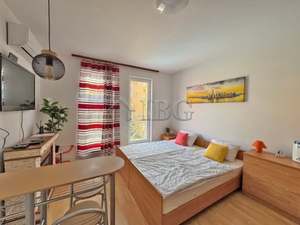 Bright studio apartment with pool view, perfect for relaxing holidays near Sunny Beach. Modern inter.