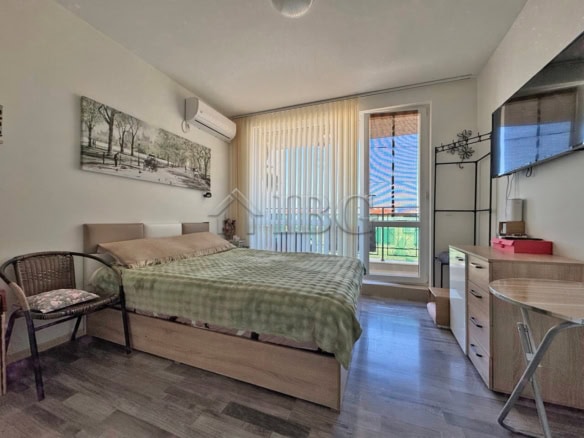 Furnished studio with balcony in Topoli Complex, Sunny Beach, offering comfortable living space and.