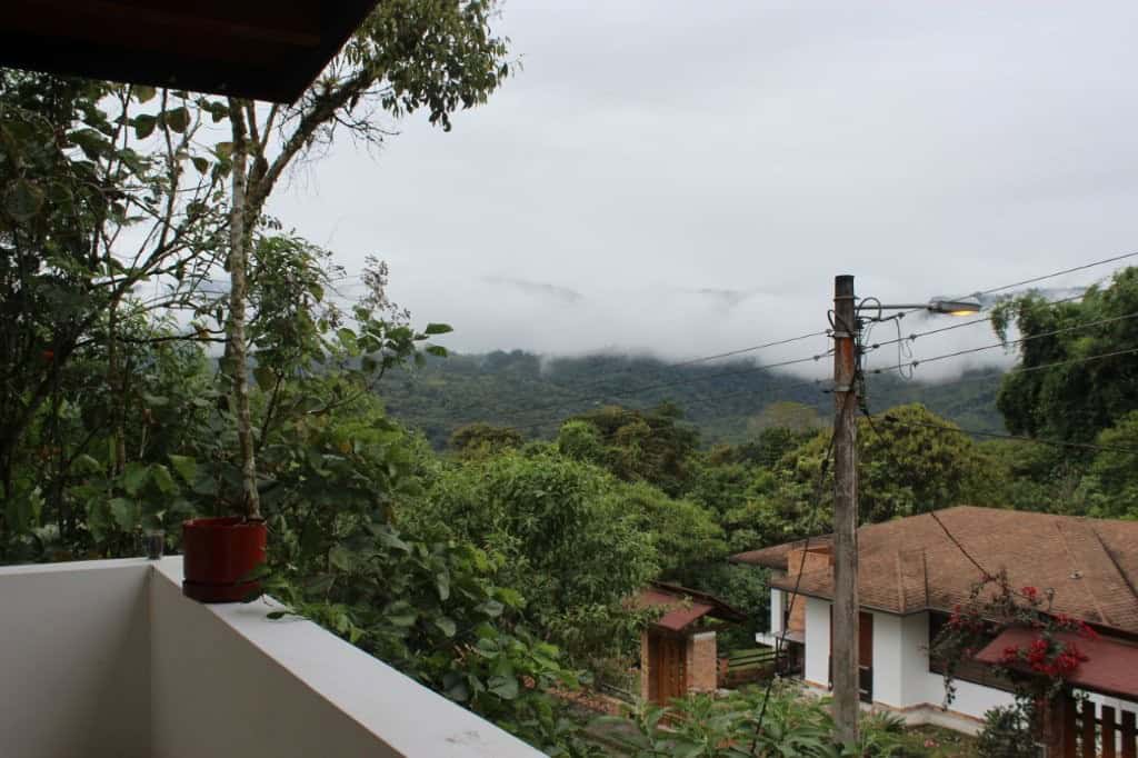 House with mountain view and greenery in Ecuador.