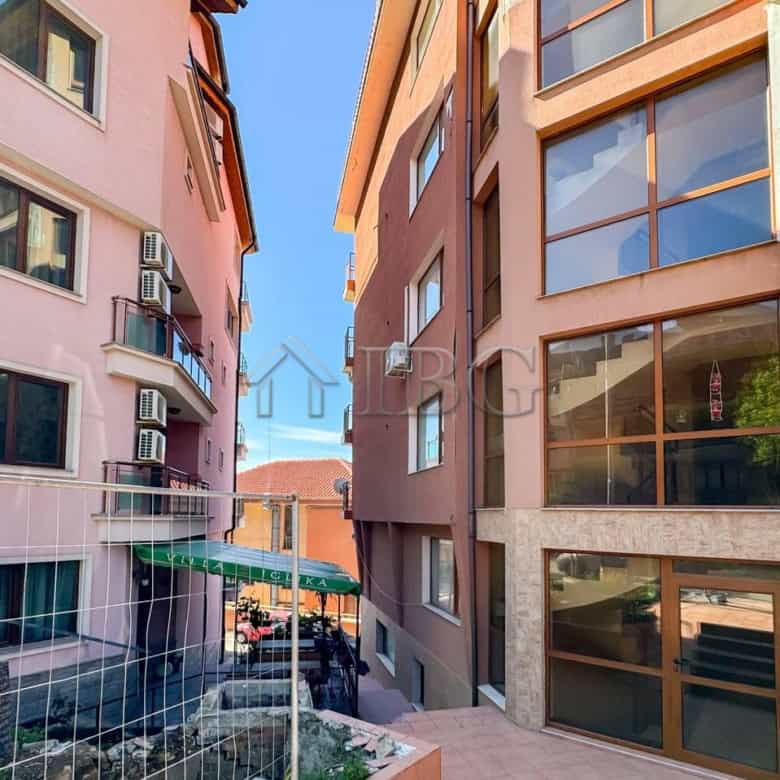 Bright 1-bedroom apartment with sea view in Sveti Vlas, Bulgaria, featuring large windows and balcon.