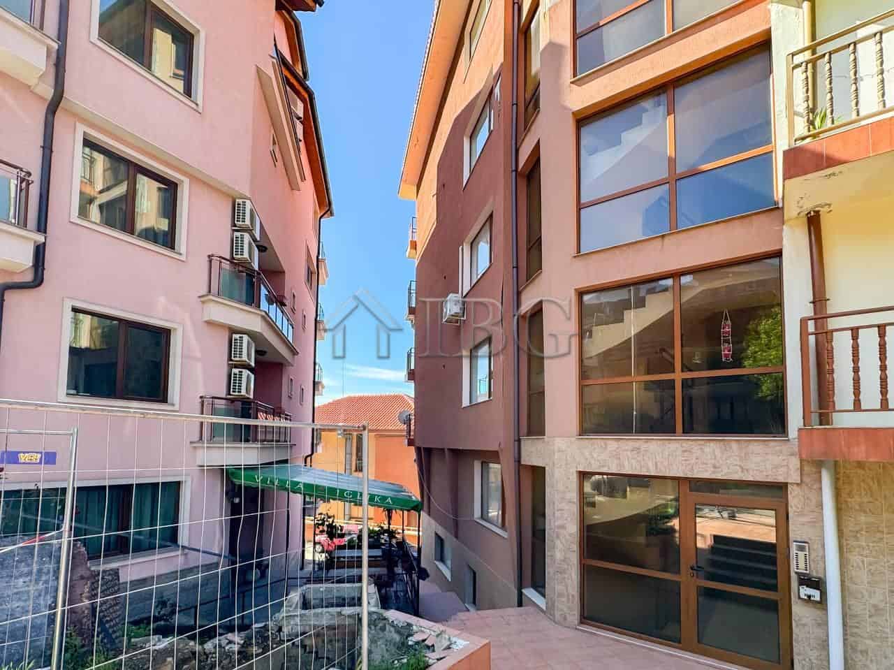 Bright 1-bedroom apartment with sea view in Sveti Vlas, Bulgaria, featuring large windows and balcon.