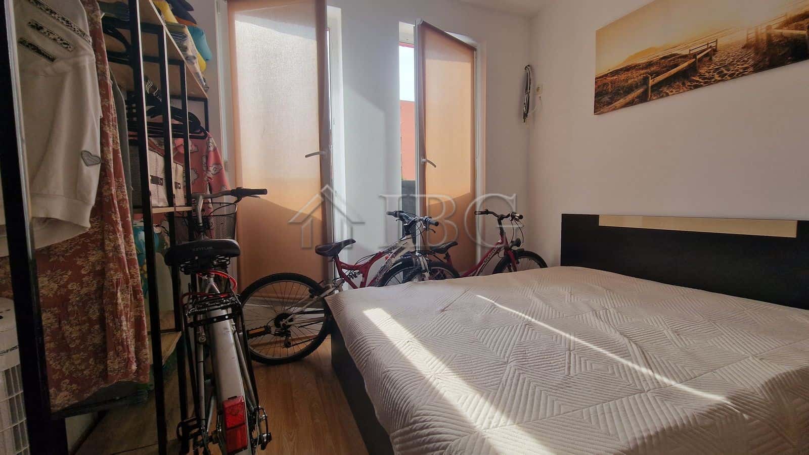 Interior view of a 1-bedroom apartment with pool view in Sunny Beach area.