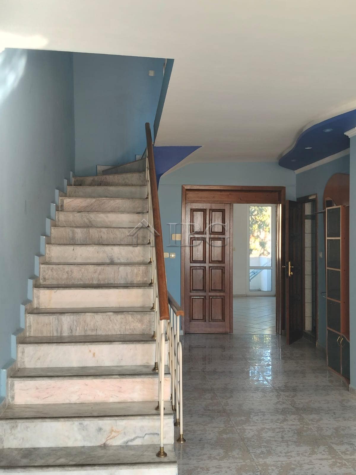 Bright interior of a maisonette with panoramic sea views in Sveti Vlas. Features a staircase, wooden.