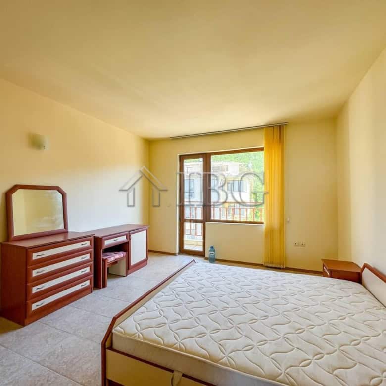 Sea view bedroom in Sveti Vlas 1-bedroom apartment with balcony and natural light.