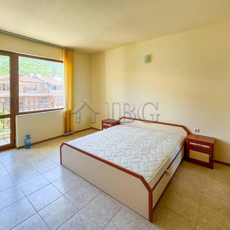 Bright 1-bedroom apartment with sea view in Sveti Vlas, featuring a spacious balcony and modern furn.