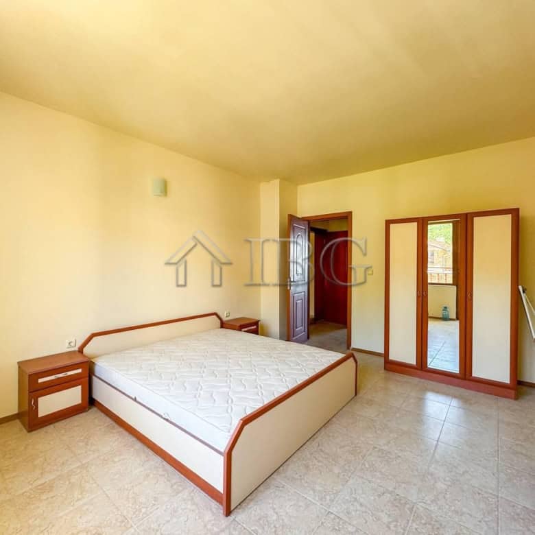 Spacious bedroom with sea view in Sveti Vlas, Rusalka area, featuring modern furniture and natural l.