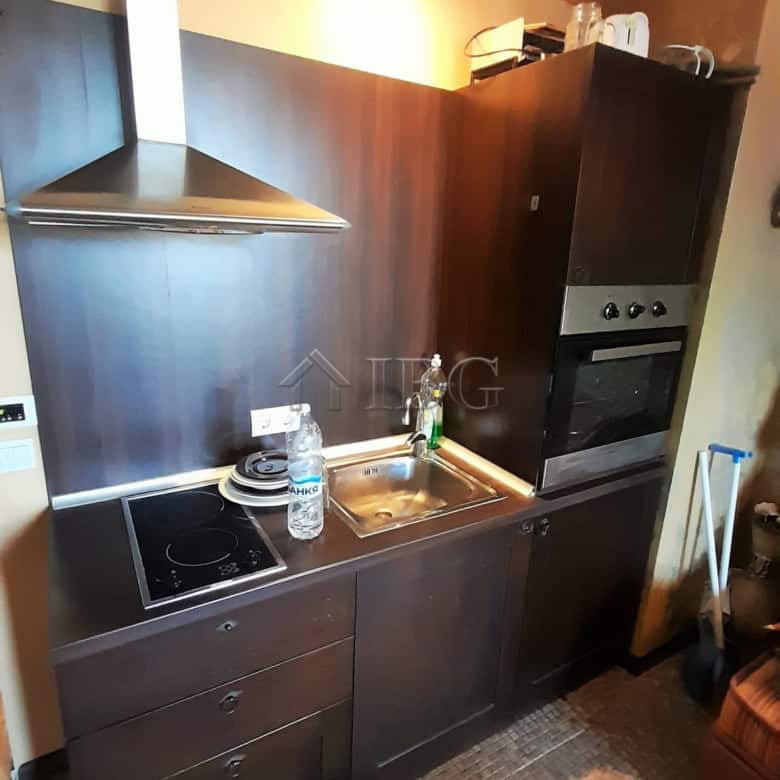 Compact kitchen in studio apartment with balcony at Royal Beach Barceló, Sunny Beach.