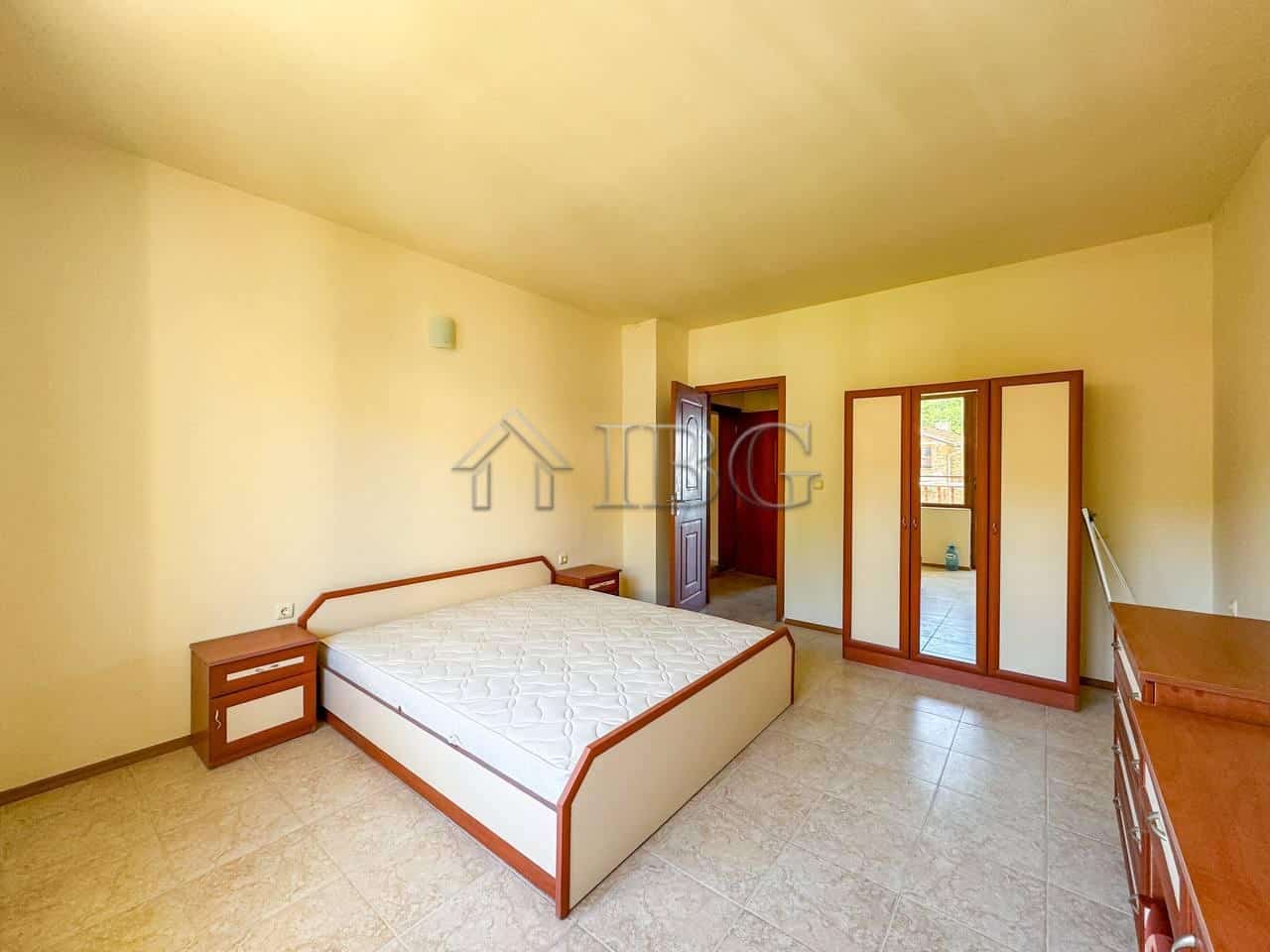 Spacious bedroom with sea view in Sveti Vlas, Rusalka area, featuring modern furniture and natural l.