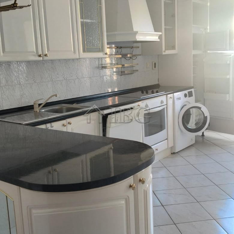 Bright kitchen with modern appliances and panoramic sea views. Perfect for comfortable living in Sve.