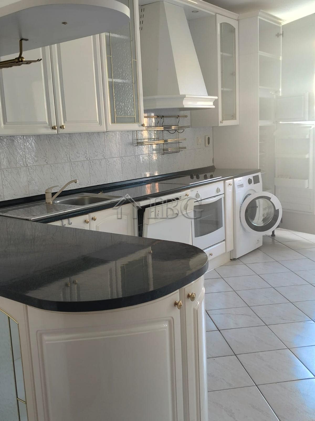 Bright kitchen with modern appliances and panoramic sea views. Perfect for comfortable living in Sve.