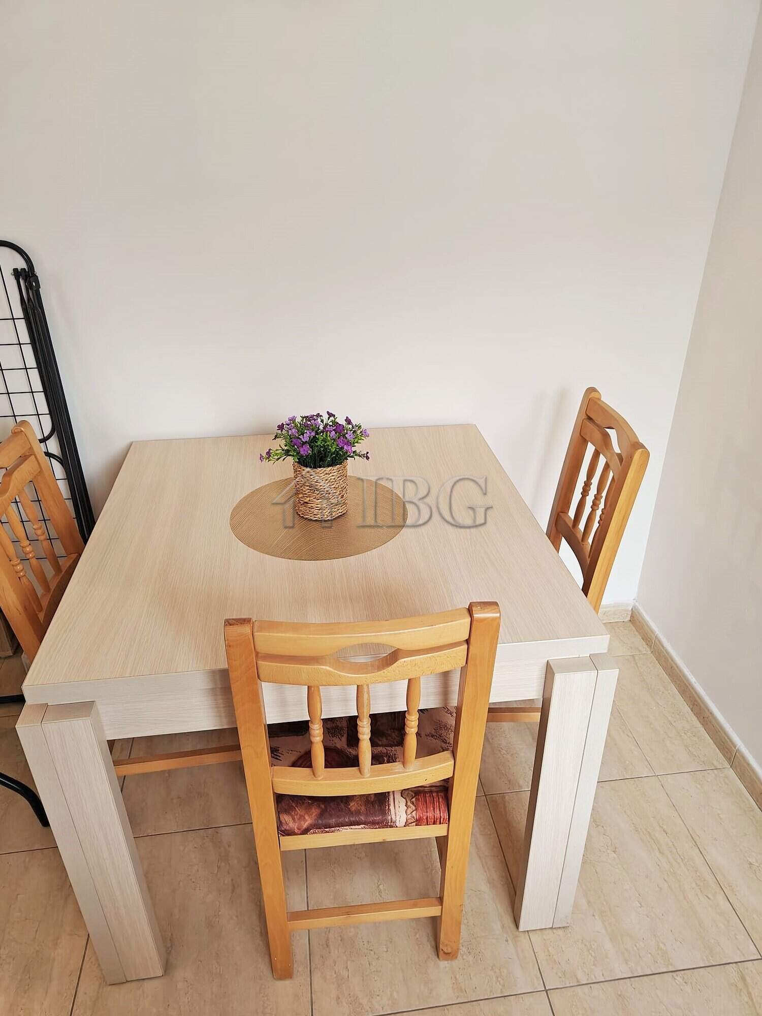Compact studio with separate kitchen and balcony, perfect for seaside living.