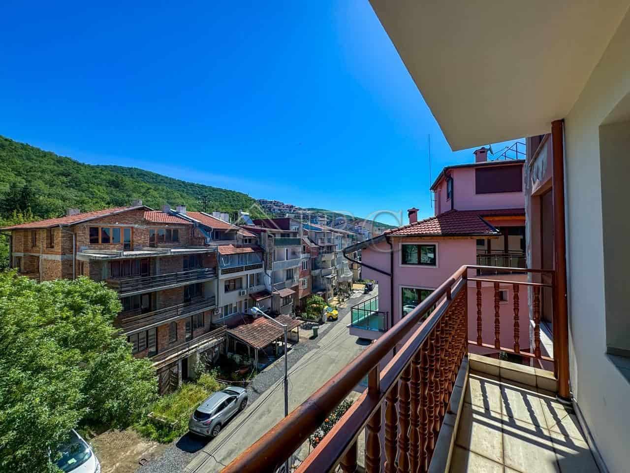 Bright apartment with balcony overlooking Sveti Vlas coastline and surrounding hills. Perfect for se.