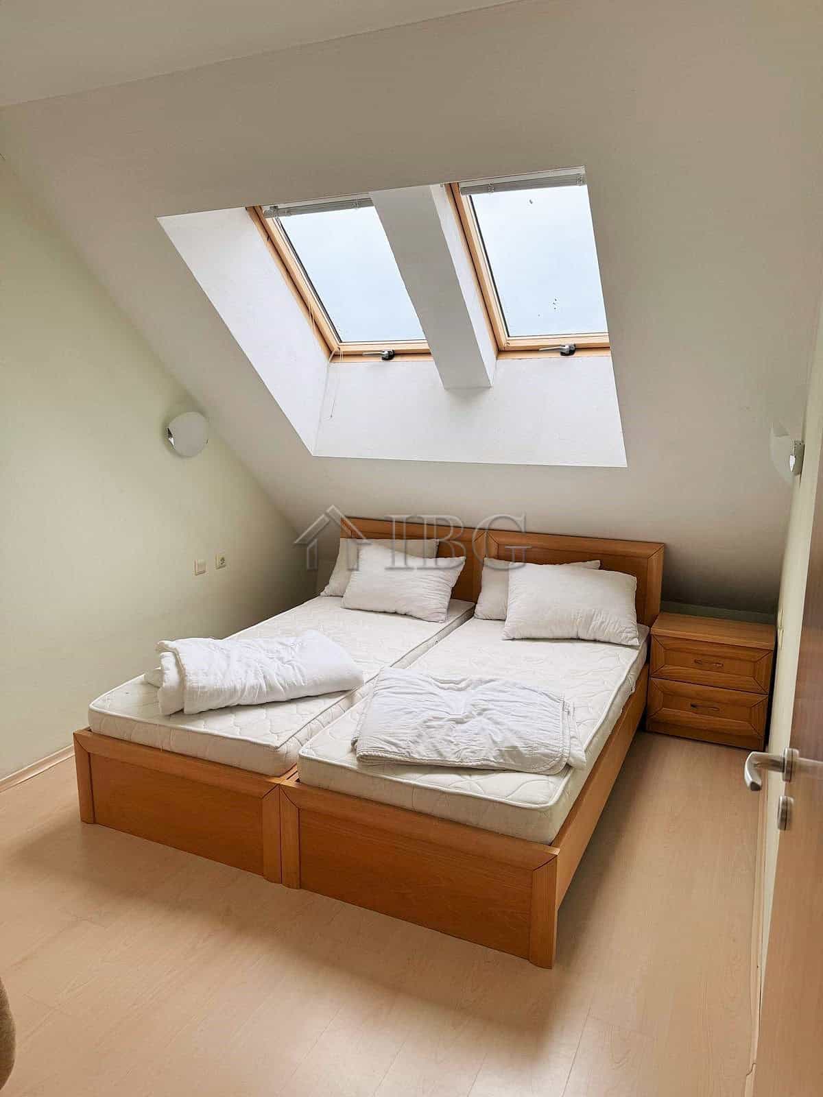 Cozy Bedroom with Skylight and Pool View Bright bedroom with skylight windows overlooking the pool at Pollo Resort, Sunny Beach. Perfect for.