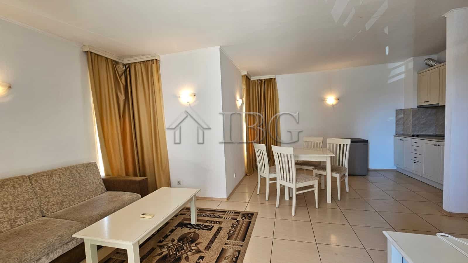 Bright interior of a spacious apartment in Sunny Beach, Bulgaria, featuring a living room, dining ar.