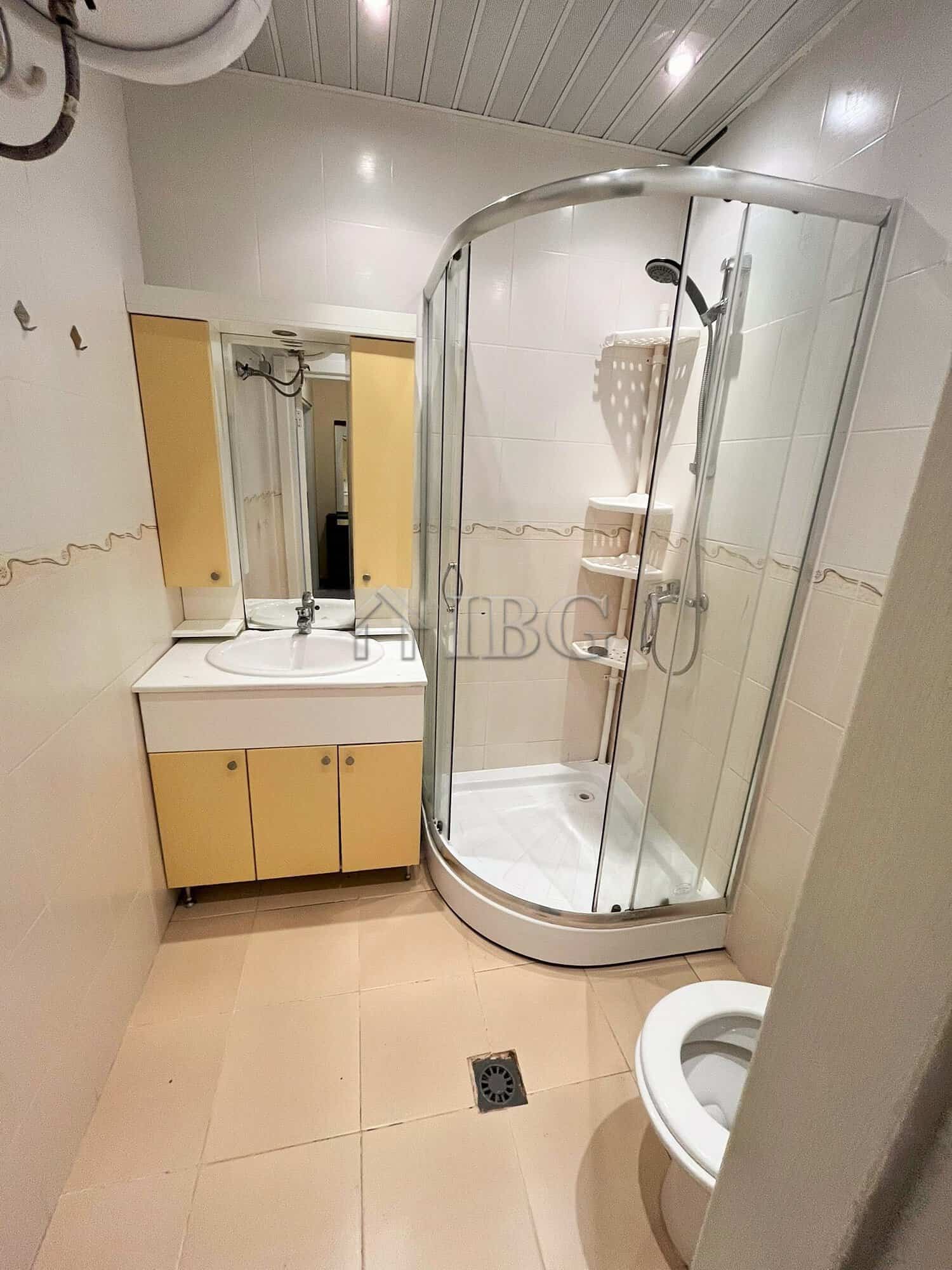 Furnished 1-Bedroom Apartment Near Cacao Beach Bright bathroom with shower enclosure in Sun City 3, Sunny Beach.