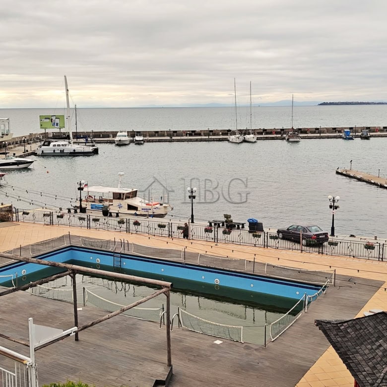 Seaside marina with boats and calm waters near Sveti Vlas.