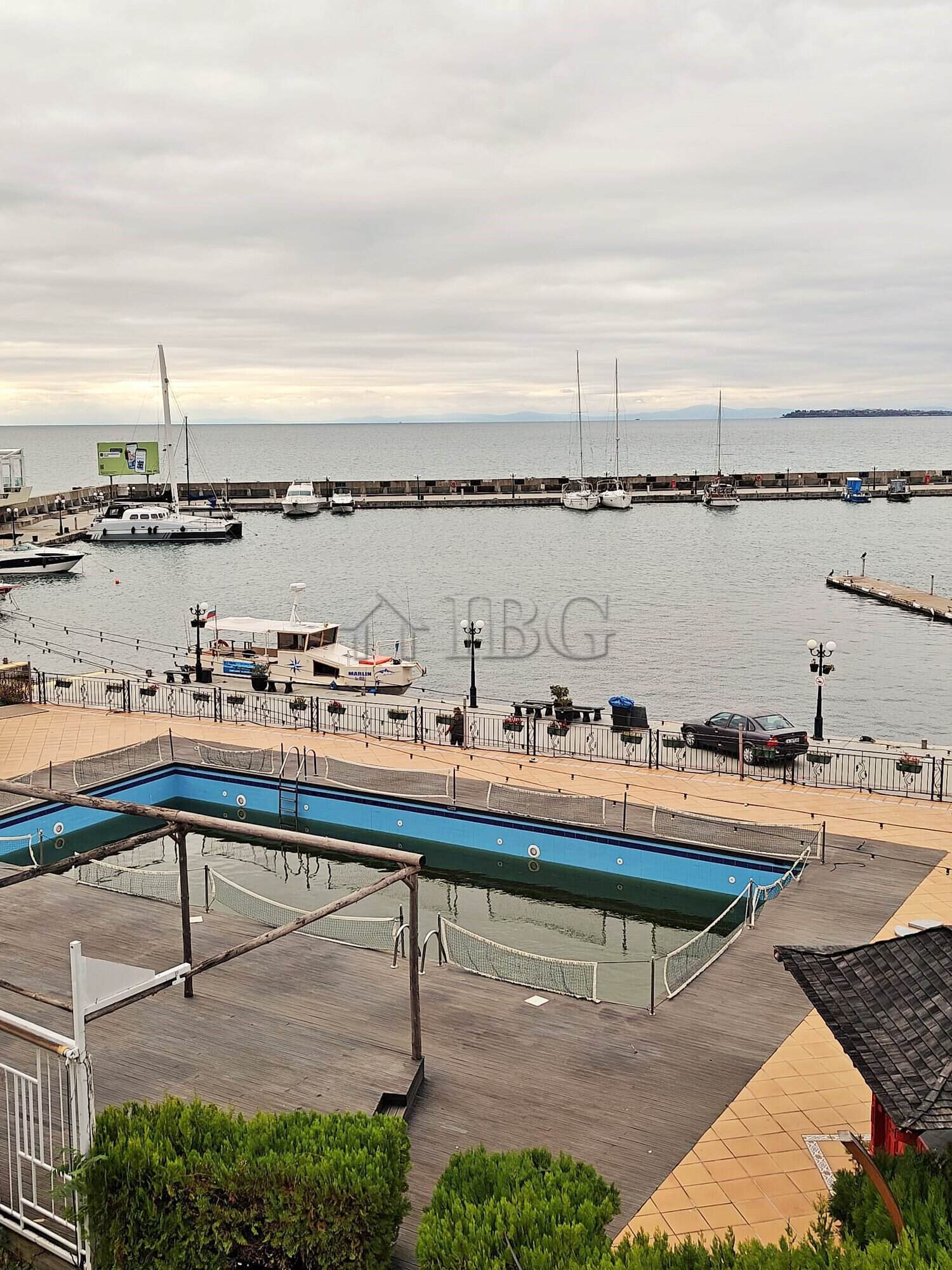 Seaside marina with boats and calm waters near Sveti Vlas.