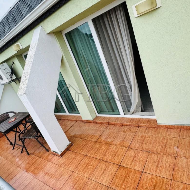 Cozy balcony of a 2-room apartment overlooking the pool at Pollo Resort, Sunny Beach.