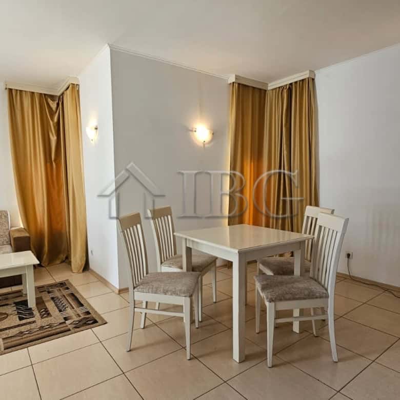 Bright living room with dining area in Tria Apartments, Sunny Beach.