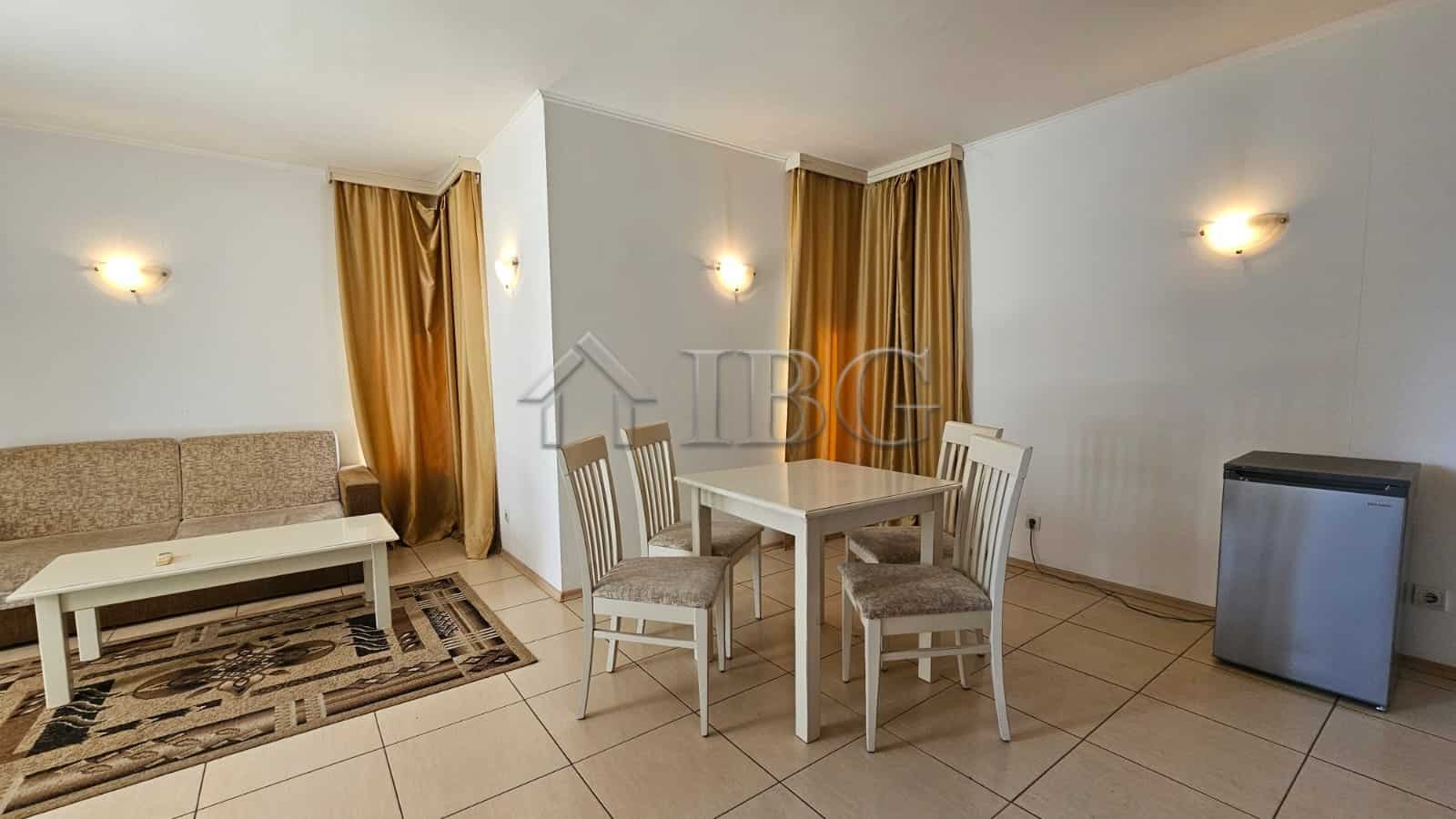 Bright living room with dining area in Tria Apartments, Sunny Beach.