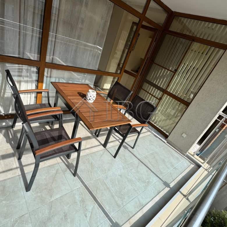 Furnished studio with separate kitchen and balcony in Sun City 1, Sunny Beach. Modern interior with.
