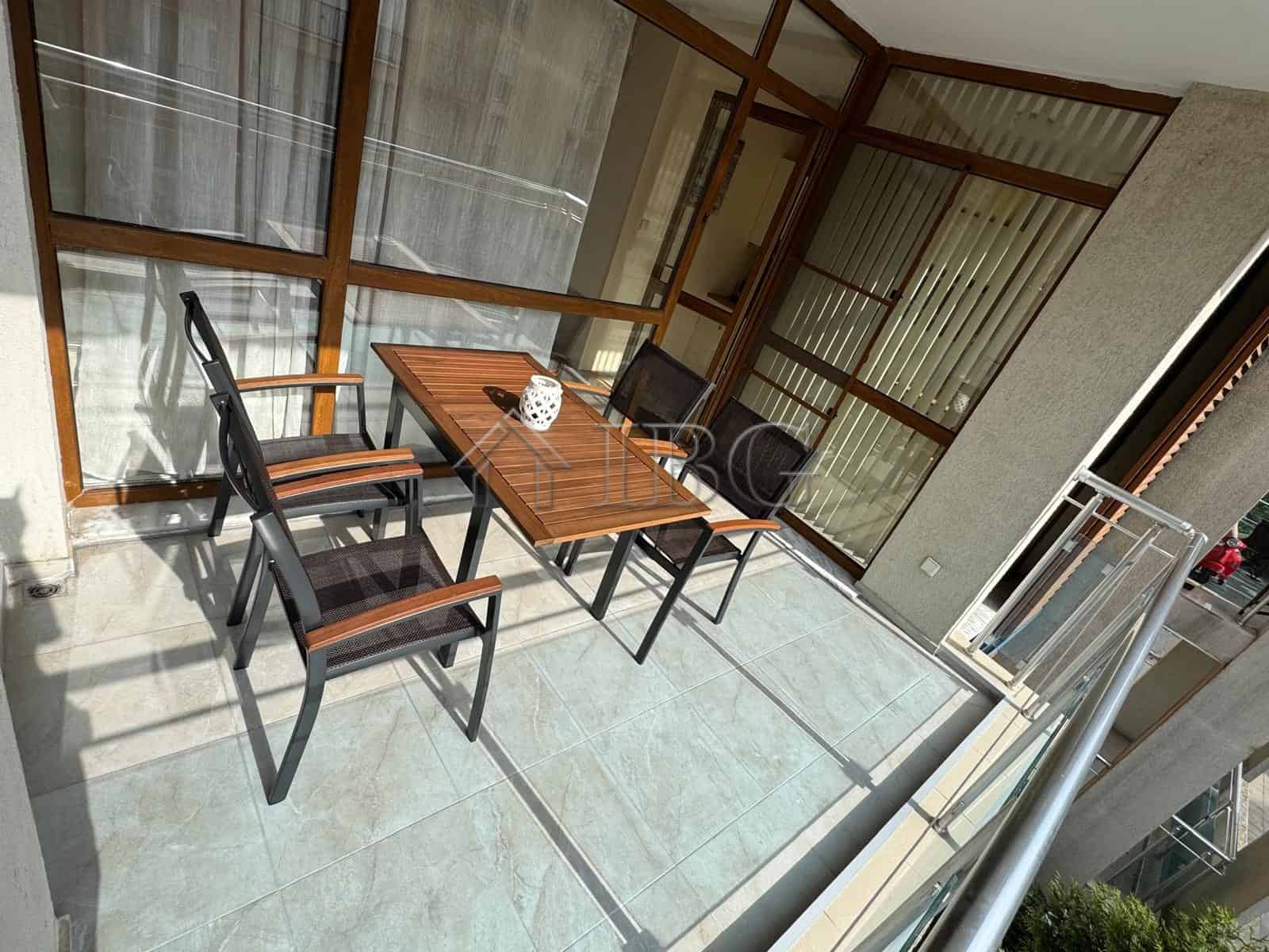 Furnished studio with separate kitchen and balcony in Sun City 1, Sunny Beach. Modern interior with.