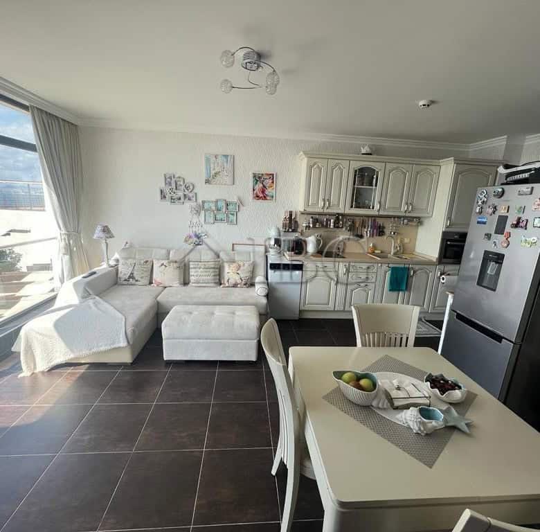 Elegant two-bedroom apartment overlooking the sea in Sveti Vlas. Modern interior with spacious livin.