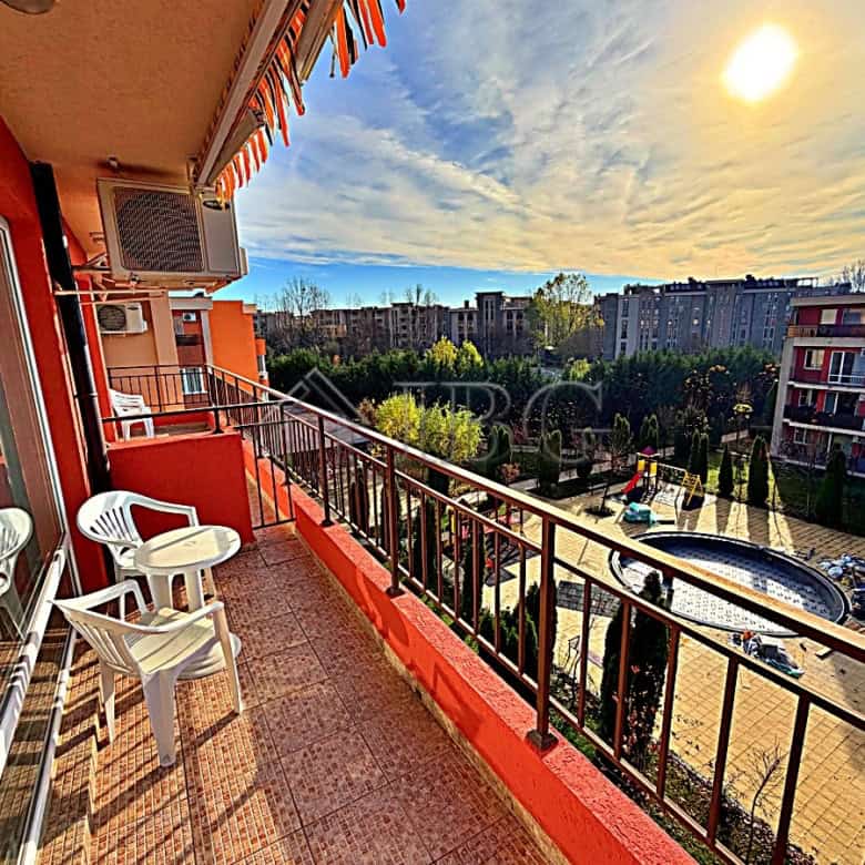 Balcony with pool and city views at Orchid Fort Club, Sunny Beach.