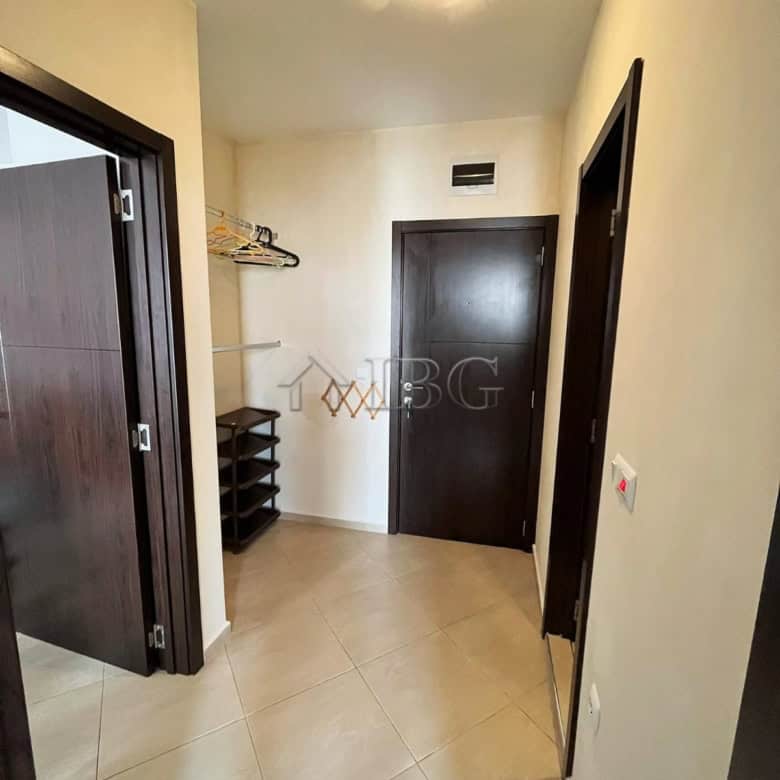Furnished 1-bedroom apartment entrance at Cascadas Family Resort, Sunny Beach, with modern decor and.
