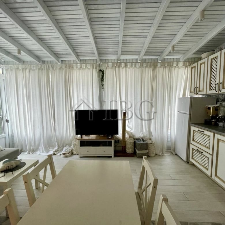 Bright living room with large windows and white curtains in Sun Gate, Sunny Beach.