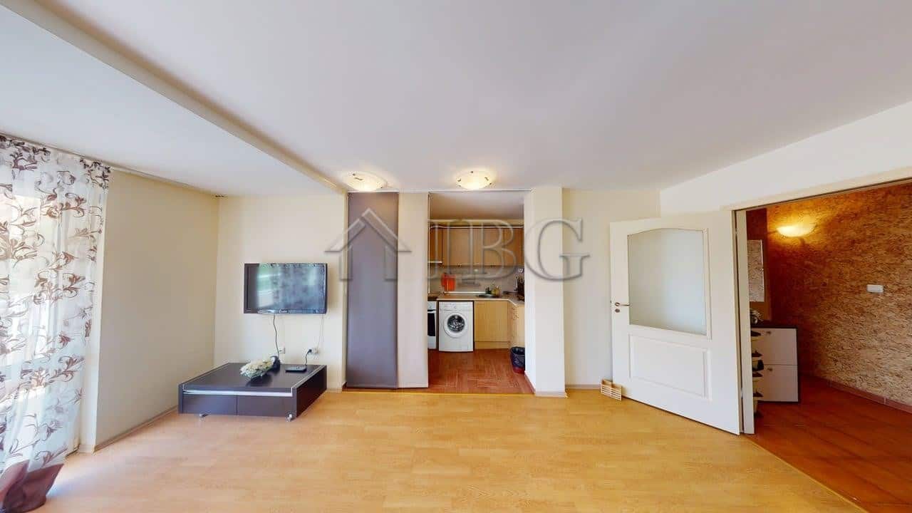 Spacious 2-bedroom apartment in Sunny Fort complex, Sunny Beach, with open-plan living area and mode.
