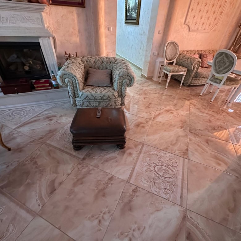 Elegant living room with classic furniture and marble flooring in Venera Palace, Sunny Beach.