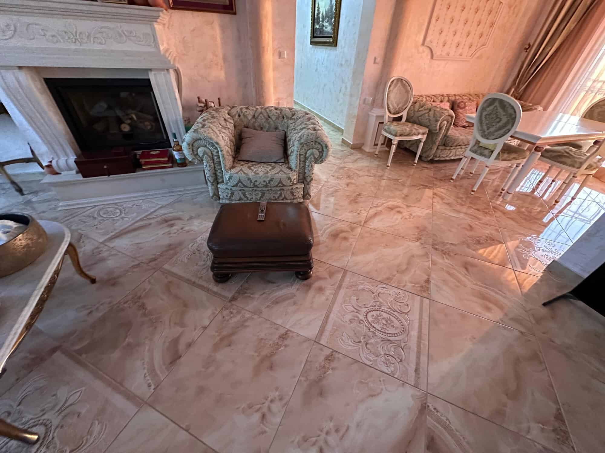 Elegant living room with classic furniture and marble flooring in Venera Palace, Sunny Beach.