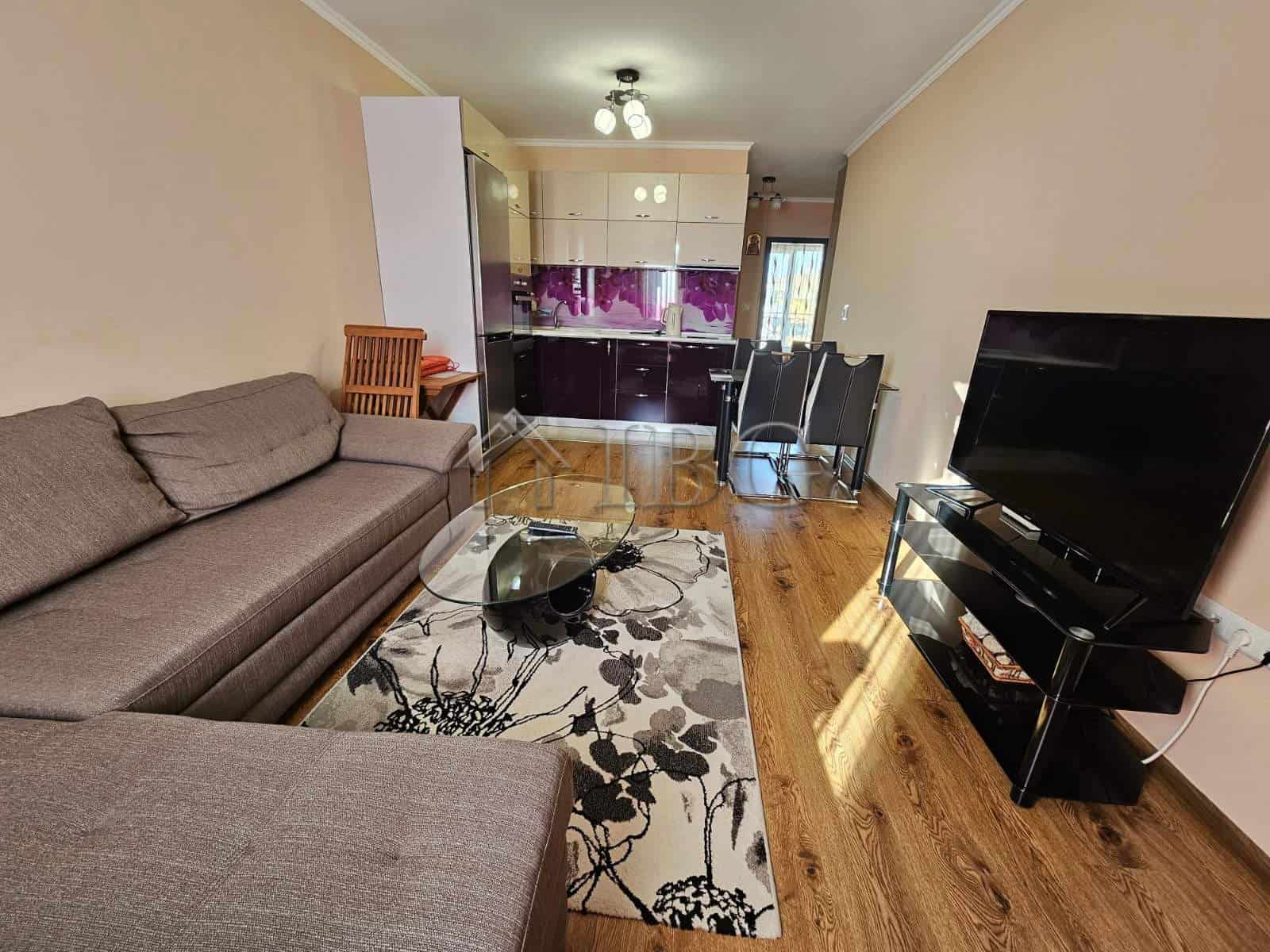 Bright living room with modern furnishings and partial sea view in Villa Katerina, Ravda.