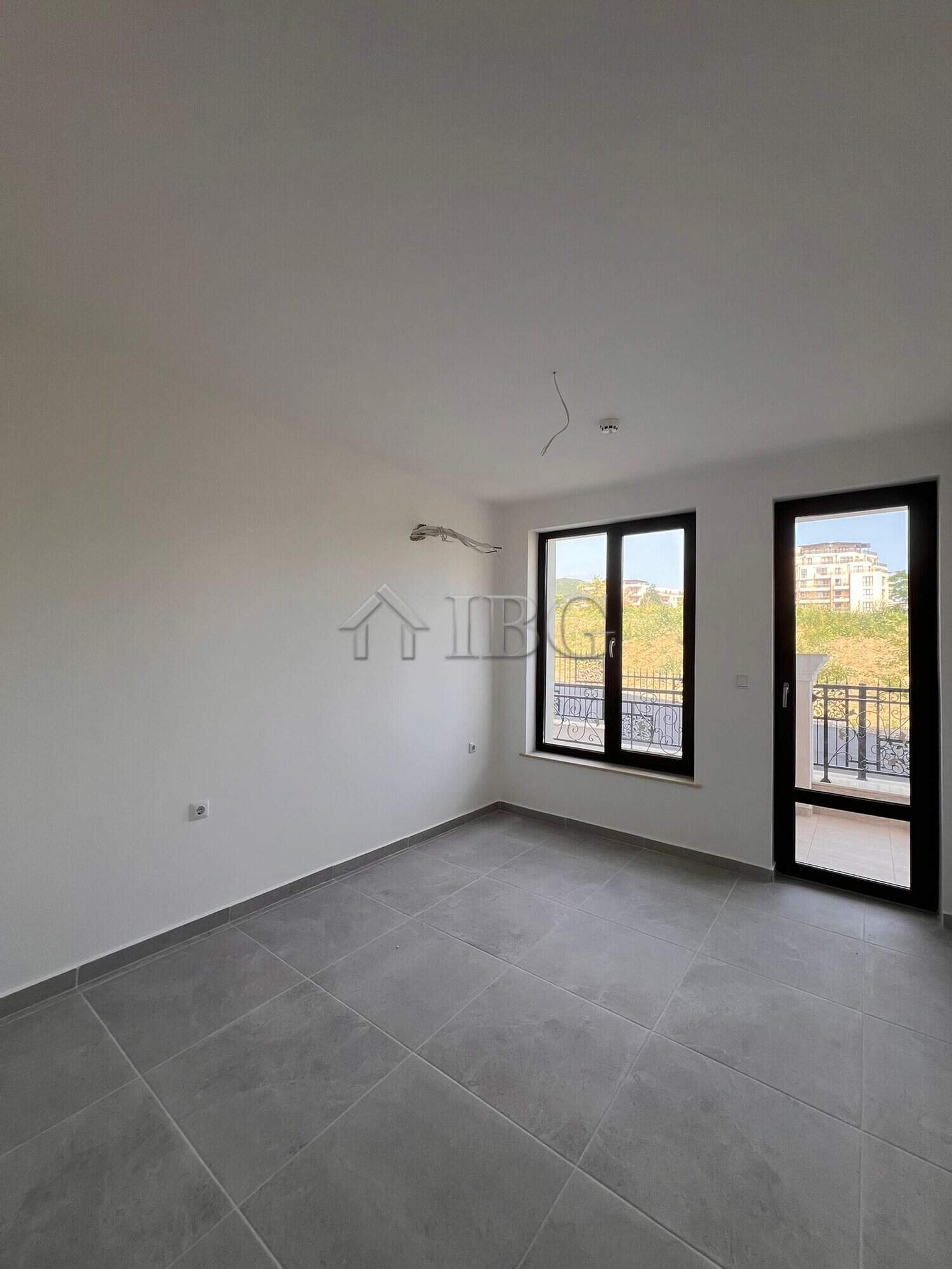 Bright living room with large windows in Sveti Vlas.