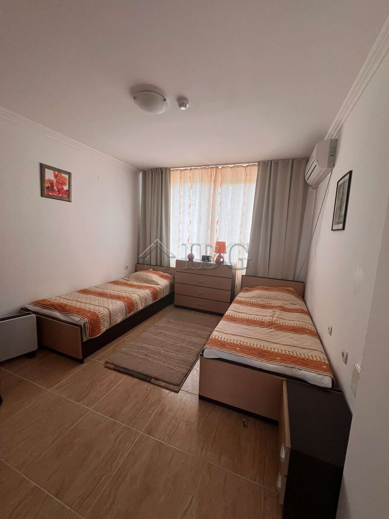Two-bedroom apartment in Sveti Vlas with sea and pool vistas, modern furnishings, and bright natural.