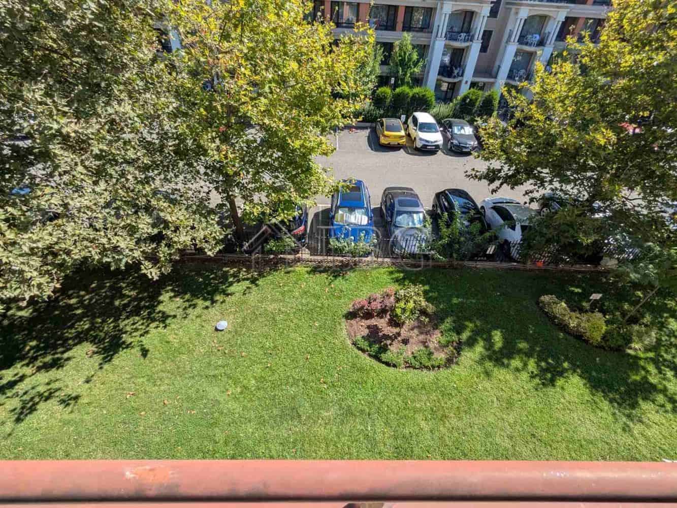 Pool view from a balcony in Sveti Vlas apartment complex.
