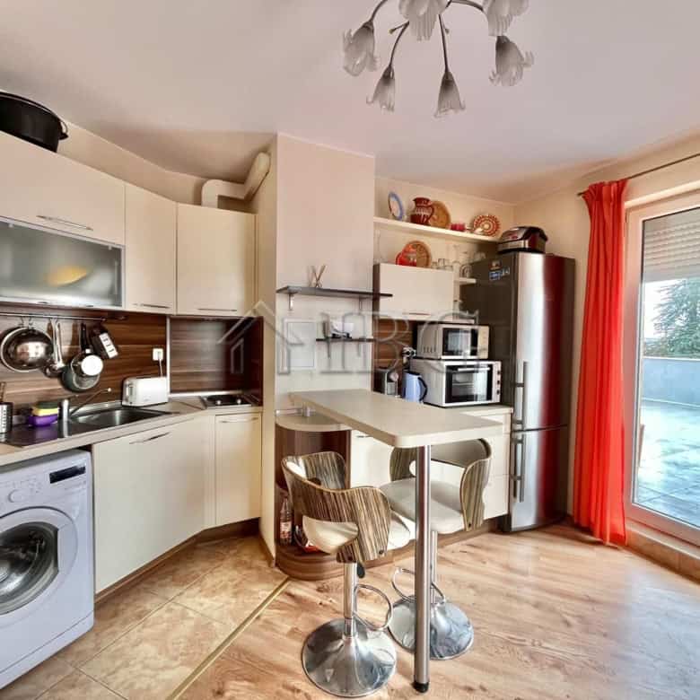 Bright apartment with modern kitchen and large terrace overlooking the sea.