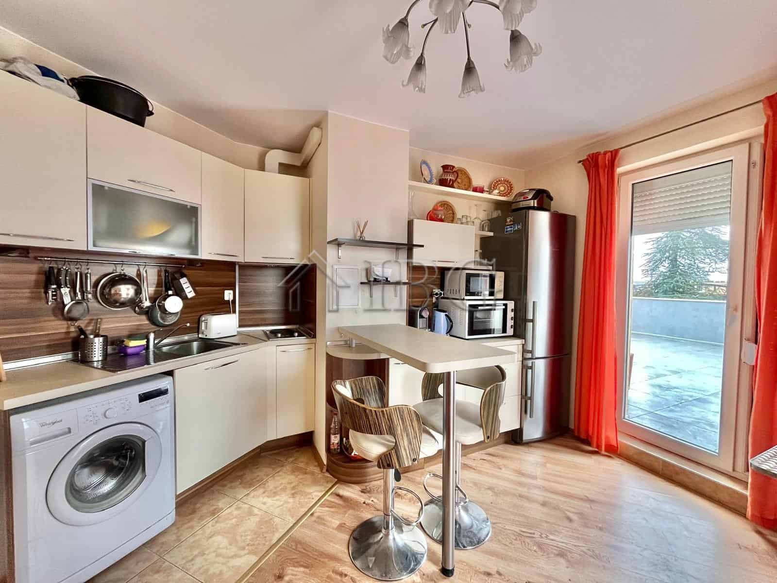 Bright apartment with modern kitchen and large terrace overlooking the sea.
