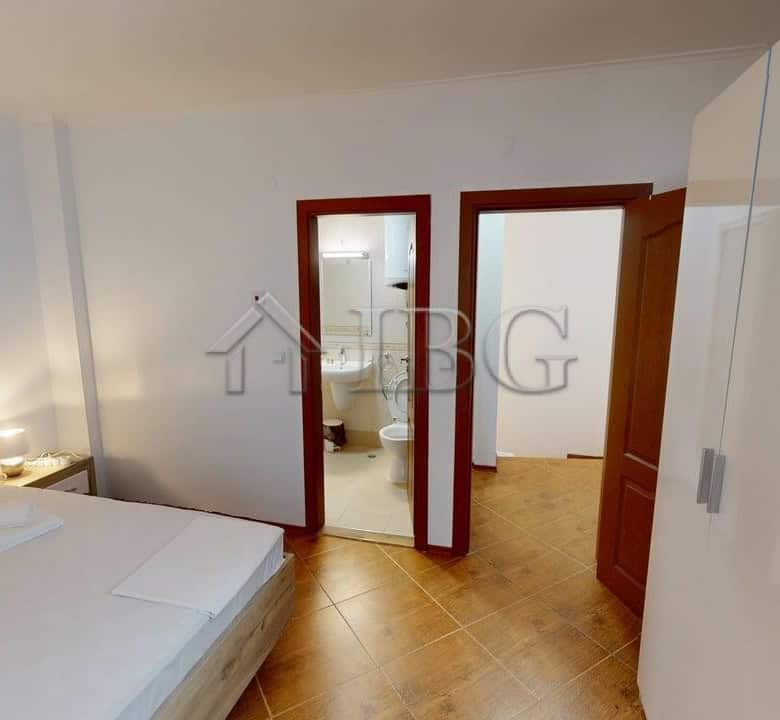 Bright bedroom with modern furnishings in Bay View Villas, Kosharitsa.