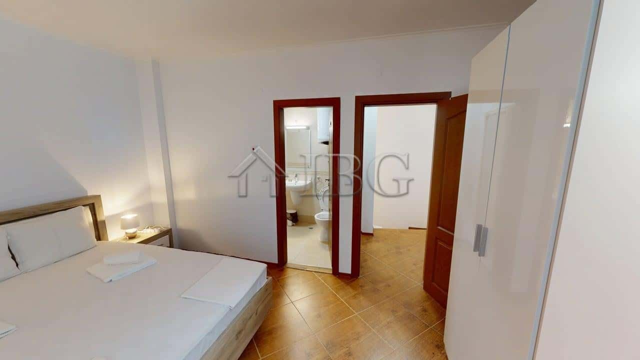 Bright bedroom with modern furnishings in Bay View Villas, Kosharitsa.