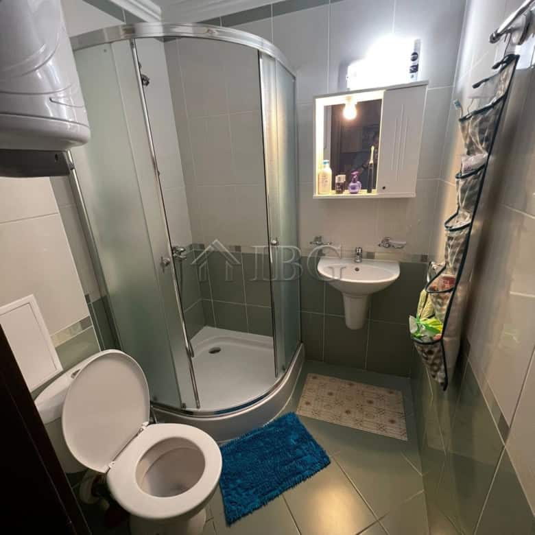Bright bathroom with shower, sink, and toilet in Kambani 3 complex, Sveti Vlas.