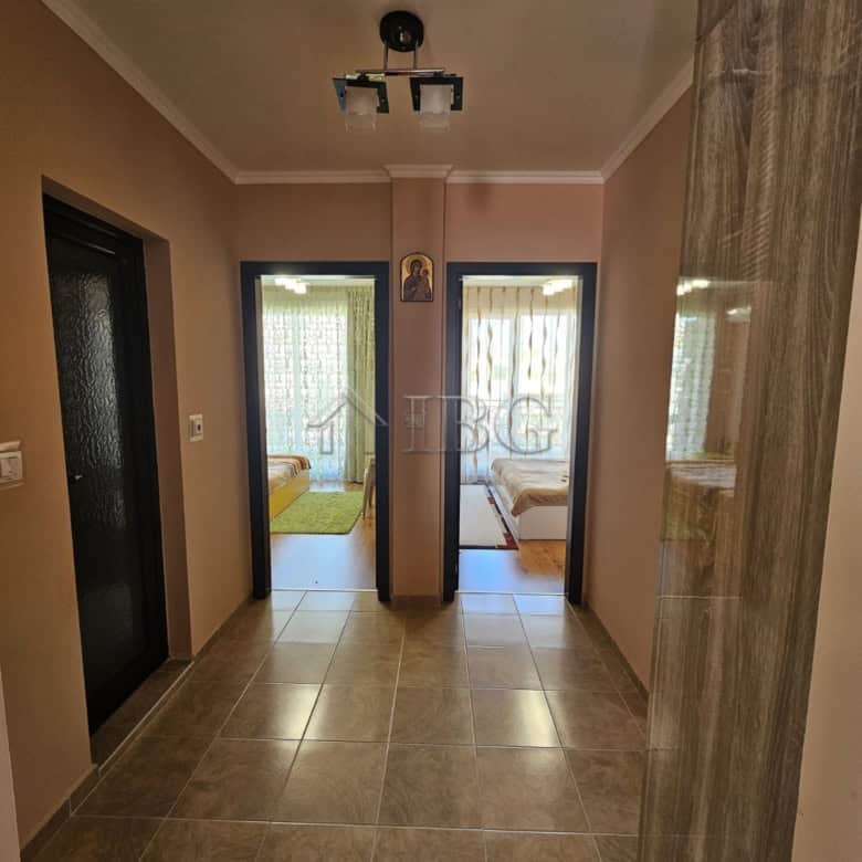 Bright hallway leading to two bedrooms with partial sea views in Villa Katerina, Ravda.