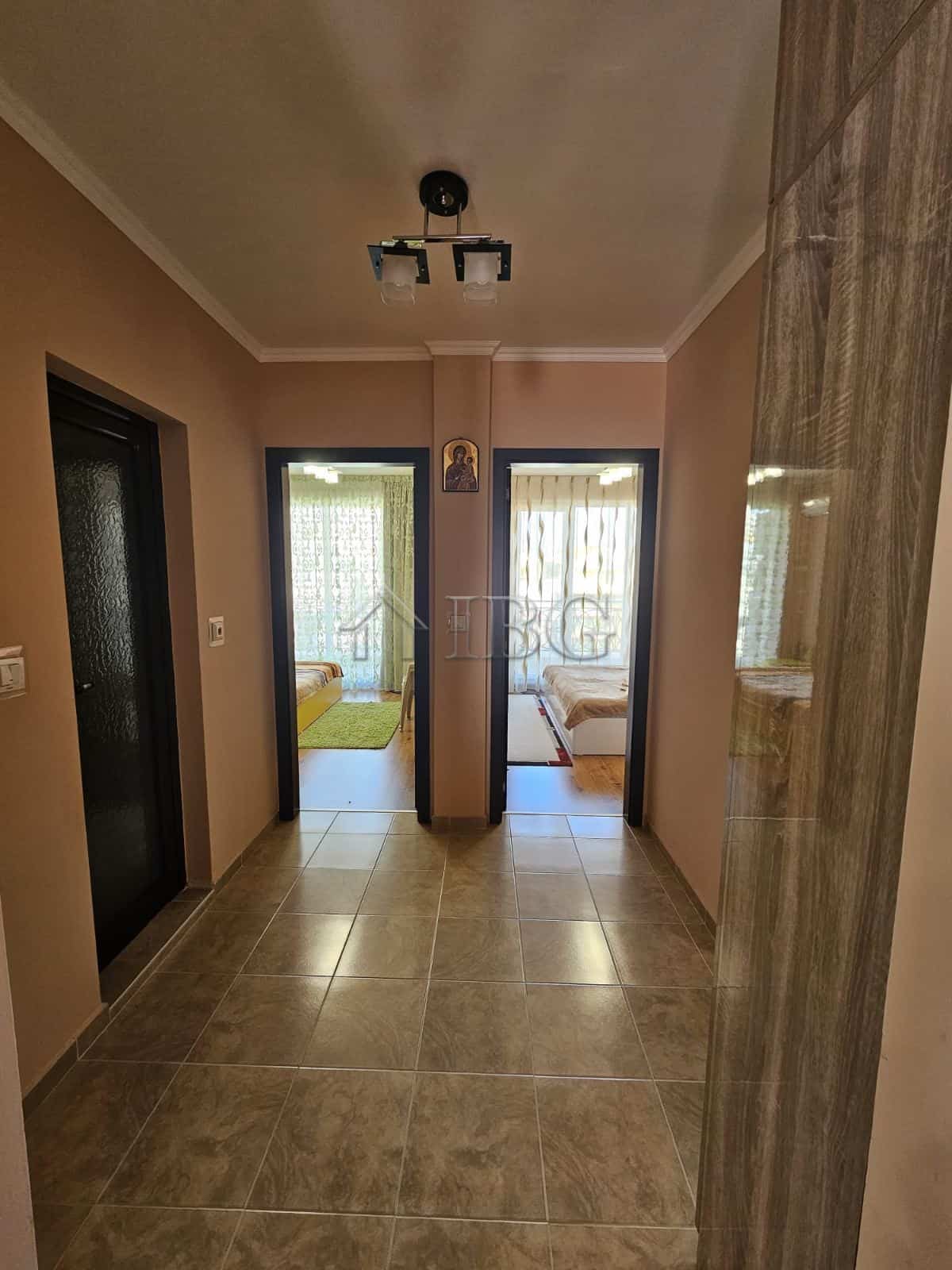 Bright hallway leading to two bedrooms with partial sea views in Villa Katerina, Ravda.