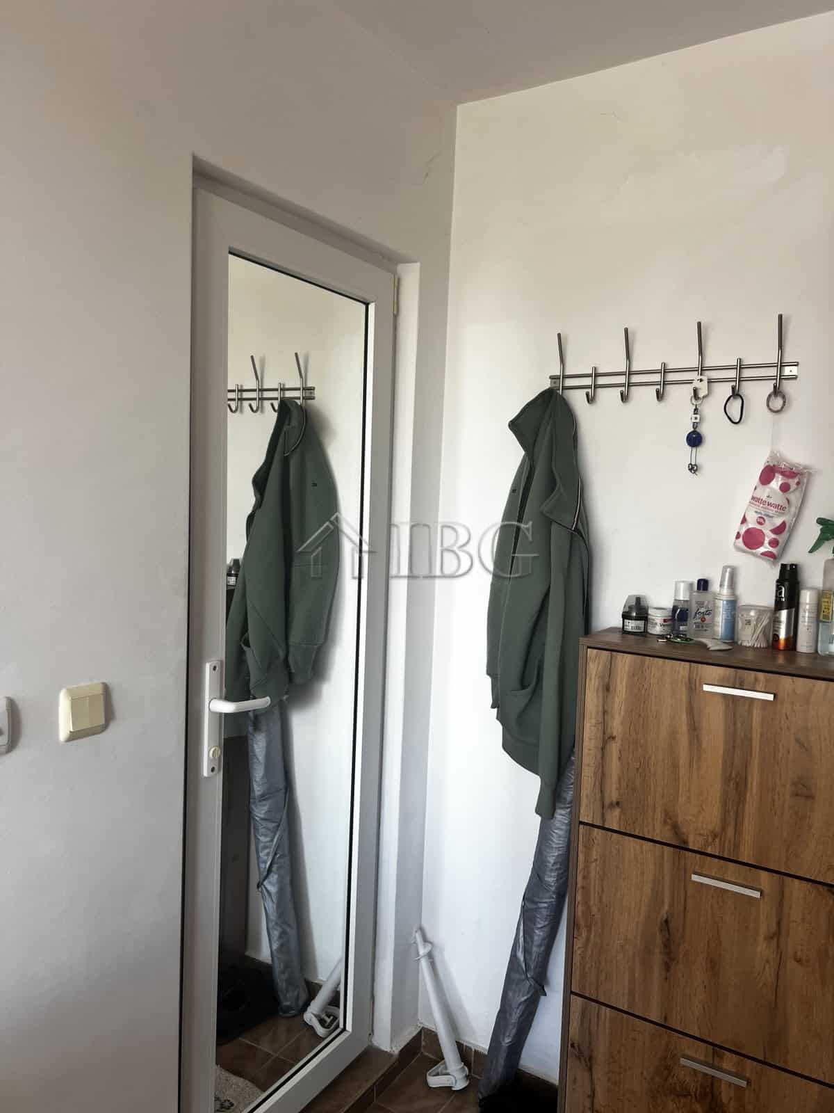 Bright bedroom with sea view in Ravda residential building.