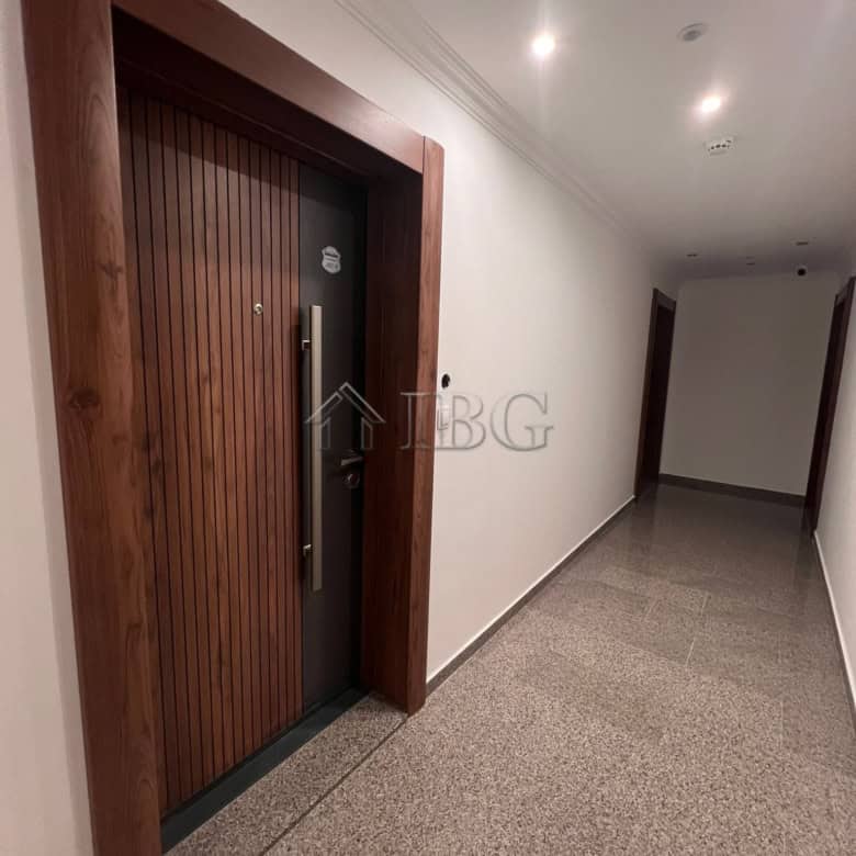 Entrance door of a modern one-bedroom apartment in Sveti Vlas, Bulgaria.