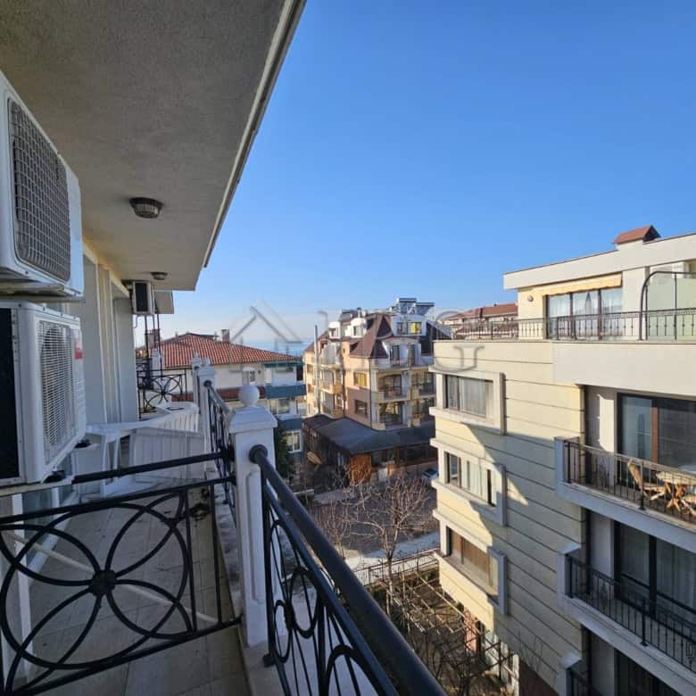 Bright balcony of a 2-bedroom apartment with partial sea view in Villa Katerina, Ravda.