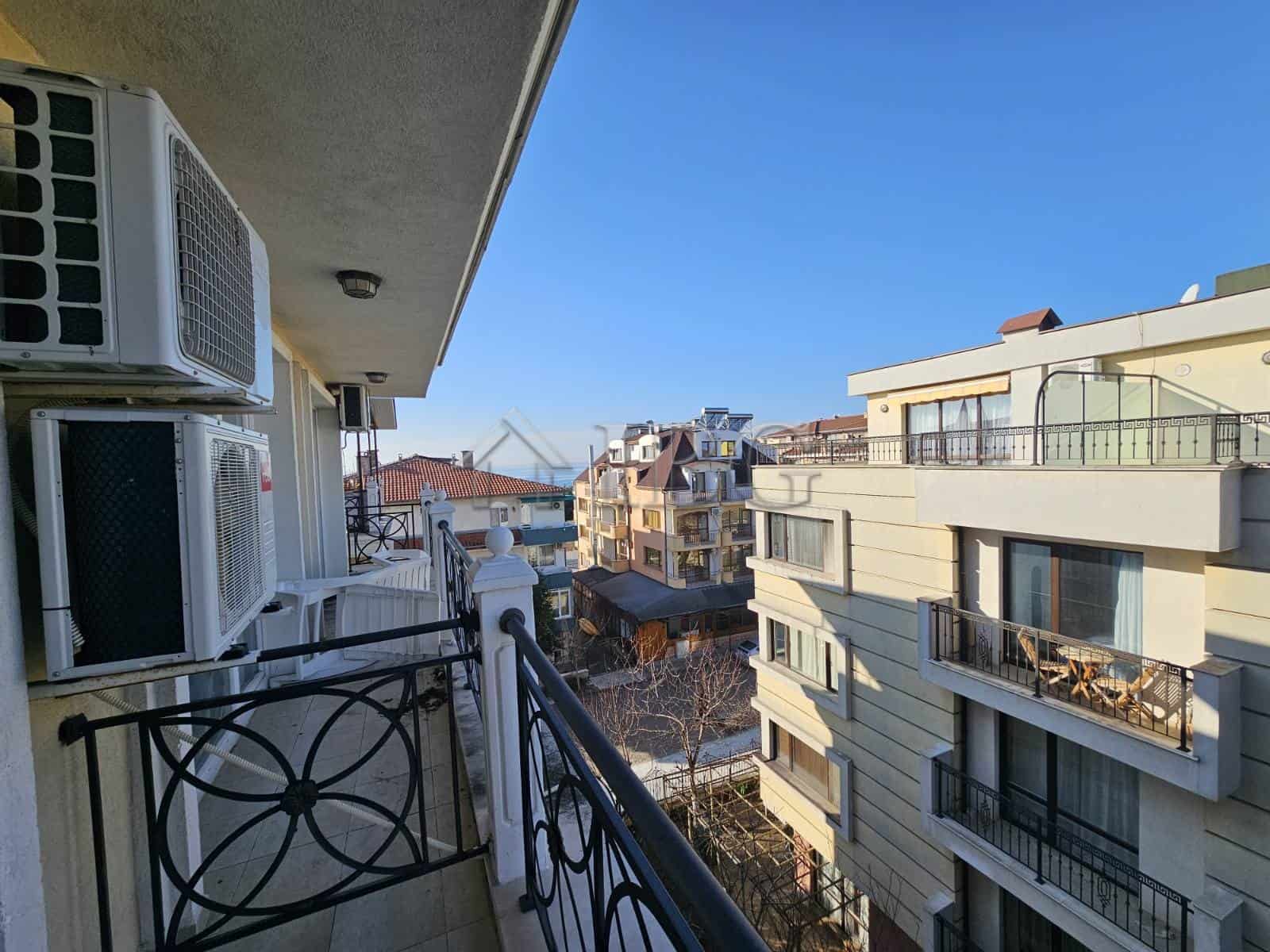 Bright balcony of a 2-bedroom apartment with partial sea view in Villa Katerina, Ravda.